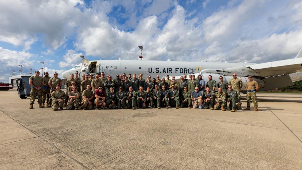 U.S. airmen with the 116th Air Control Wing, Georgia Air National Guard, pose in front an E-8C Joint STARS for its last mission at Ramstein Air Base,  Germany, Sept. 18. (Master Sgt. Jeff Rice/Air National Guard)