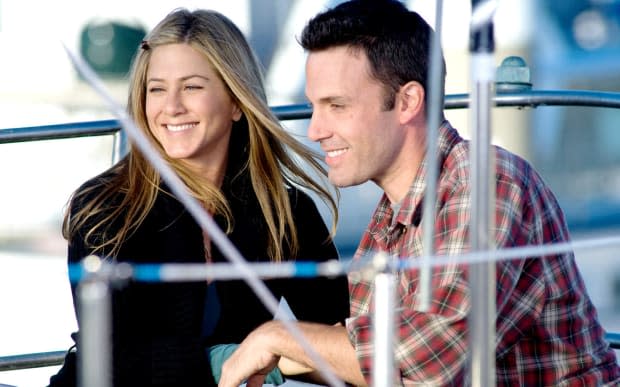 <a href="https://parade.com/914705/samuelmurrian/best-jennifer-aniston-movies-ranked/" rel="nofollow noopener" target="_blank" data-ylk="slk:Jennifer Aniston;elm:context_link;itc:0;sec:content-canvas" class="link ">Jennifer Aniston</a> and <a href="https://parade.com/1274215/jessicasager/ben-affleck-net-worth/" rel="nofollow noopener" target="_blank" data-ylk="slk:Ben Affleck;elm:context_link;itc:0;sec:content-canvas" class="link ">Ben Affleck</a> in "He's Just Not That Into You"<p>Warner Bros.</p>