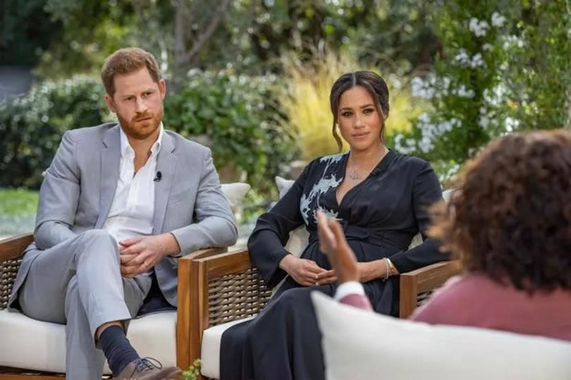 Oprah Winfrey interviewing Prince Harry and Meghan Markle