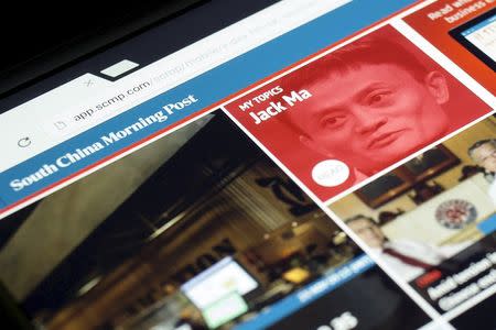 The South China Morning Post website and an image of Jack Ma, founder and executive chairman of Alibaba Group Holding Ltd, are displayed on a computer in Hong Kong, China, in this November 23, 2015 file photo illustration. REUTERS/Tyrone Siu/Files