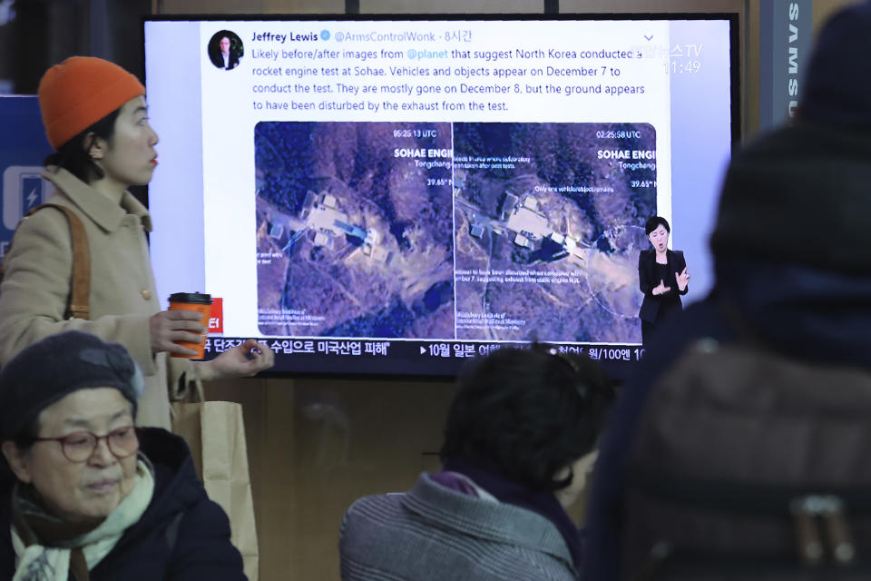 A TV screen shows an image of a North Korean long-range rocket launch site during a news program at the Seoul Railway Station in Seoul, South Korea, Monday, Dec. 9, 2019. North Korea said Sunday it carried out a "very important test" at its long-range rocket launch site that it reportedly rebuilt after having partially dismantled it after entering denuclearization talks with the United States last year.(AP Photo/Ahn Young-joon)