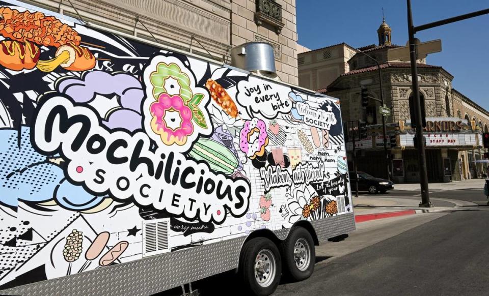 The Mochilicious Society food trailer, gets started at its grand opening on Tuolumne Street in front of The Grand and near Warnors Theatre in downtown Fresno on Tuesday, Sept. 5, 2023.