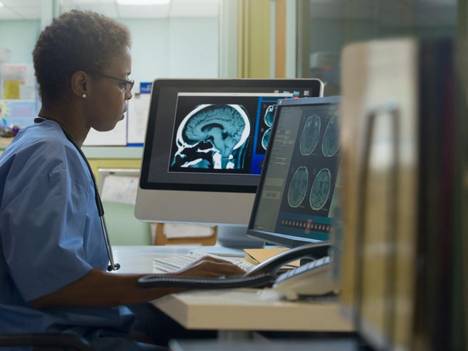 Doctor examining x-rays in hospital