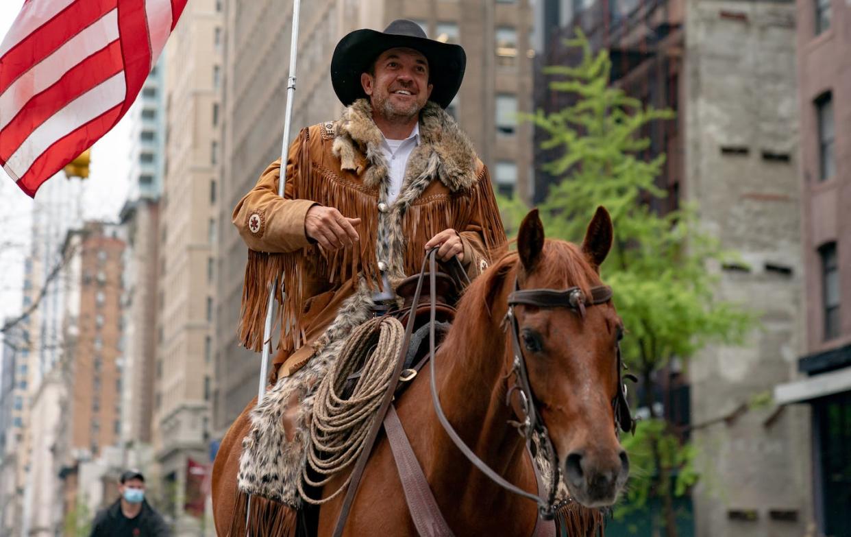 Couy Griffin, a former county commissioner in Otero County, N.M., rides a horse in New York City in May 2020 <a href="https://media.gettyimages.com/photos/otero-county-commission-chairman-and-cowboys-for-trump-cofounder-couy-picture-id1211509102" rel="nofollow noopener" target="_blank" data-ylk="slk:Gotham/Getty Images;elm:context_link;itc:0;sec:content-canvas" class="link ">Gotham/Getty Images</a>