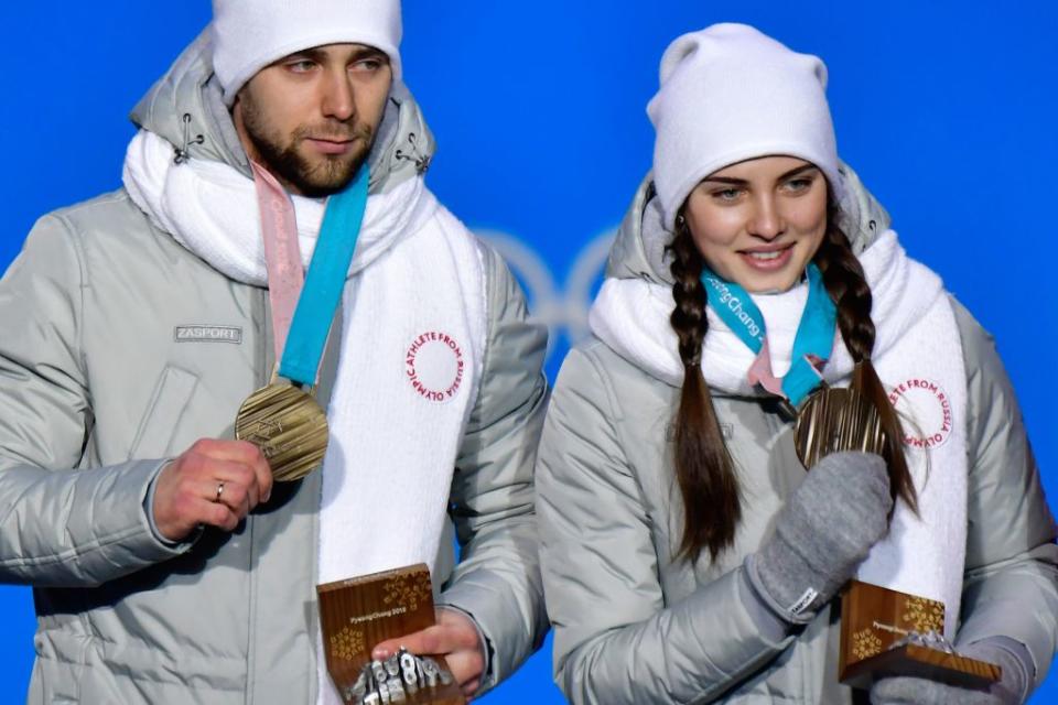 Alexander Krushelnitsky, left, with Anastasia Bryzgalova, has initially been found guilty of doping. (Getty)