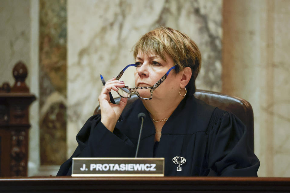 Wisconsin Supreme Court Justice Janet Protasiewicz listens to arguments during a redistricting hearing at the Wisconsin state Capitol Building in Madison, Wis., on Tuesday, Nov. 21, 2023. (Ruthie Hauge/The Capital Times via AP, Pool)