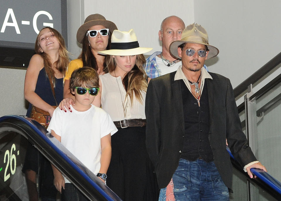 NARITA, JAPAN - JULY 18:  (R-L) Johnny Depp, Amber Heard, Jack Depp and Lily Rose Melody Depp are seen upon departure at Narita International Airport on July 18, 2013 in Narita, Japan.  (Photo by Jun Sato/WireImage)