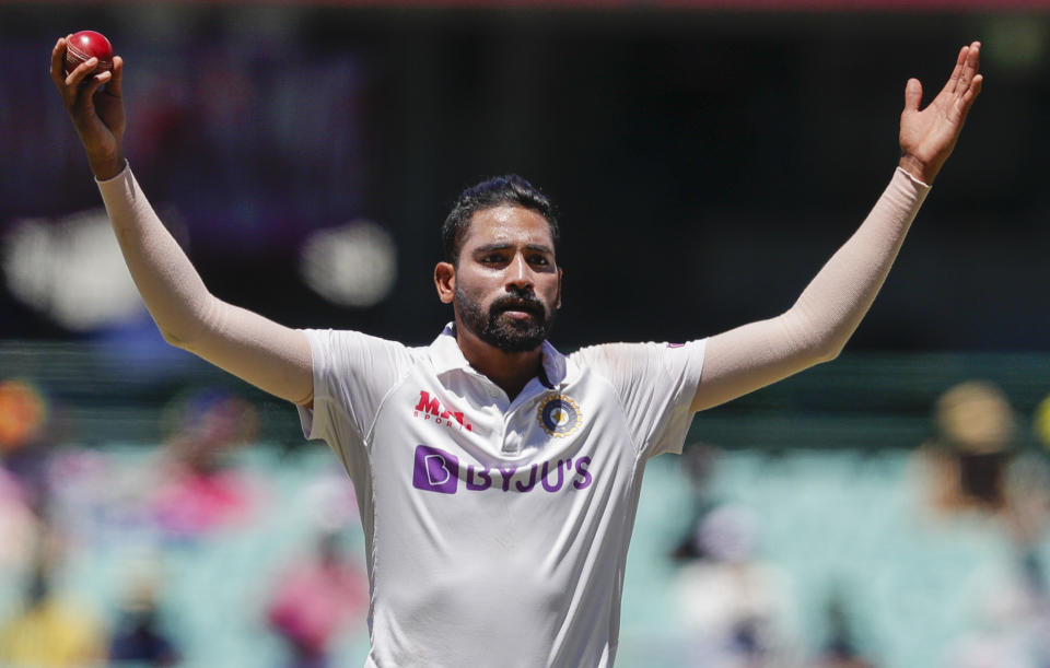 India's Mohammed Siraj gestures in frustration during play on day four of the third cricket test between India and Australia at the Sydney Cricket Ground, Sydney, Australia, Sunday, Jan. 10, 2021. (AP Photo/Rick Rycroft)
