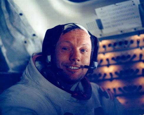 NASA handout photo of U.S. astronaut Neil Armstrong smiling in the lunar module after his historic moonwalk