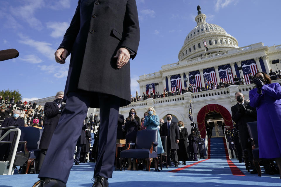 President Joe Biden walks to a podium to speak after he was sworn-in during the 59th Presidential Inauguration at the U.S. Capitol in Washington, Wednesday, Jan. 20, 2021. (AP Photo/Andrew Harnik, Pool)