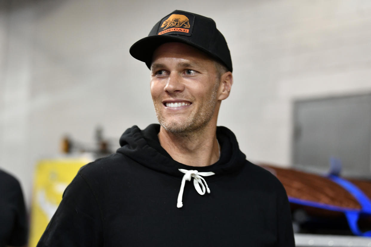 JACKSONVILLE, FLORIDA - APRIL 24: Tampa Bay Buccaneers quarterback Tom Brady arrives backstage during the UFC 261 event at VyStar Veterans Memorial Arena on April 24, 2021 in Jacksonville, Florida. (Photo by Chris Unger/Zuffa LLC)