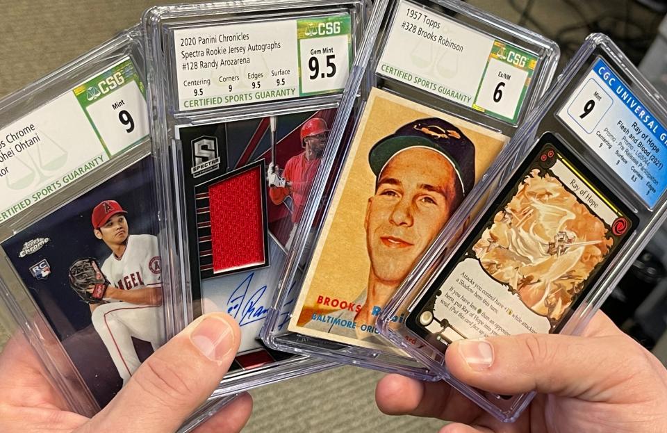An array of graded and encapsulated sports cards at CCG.