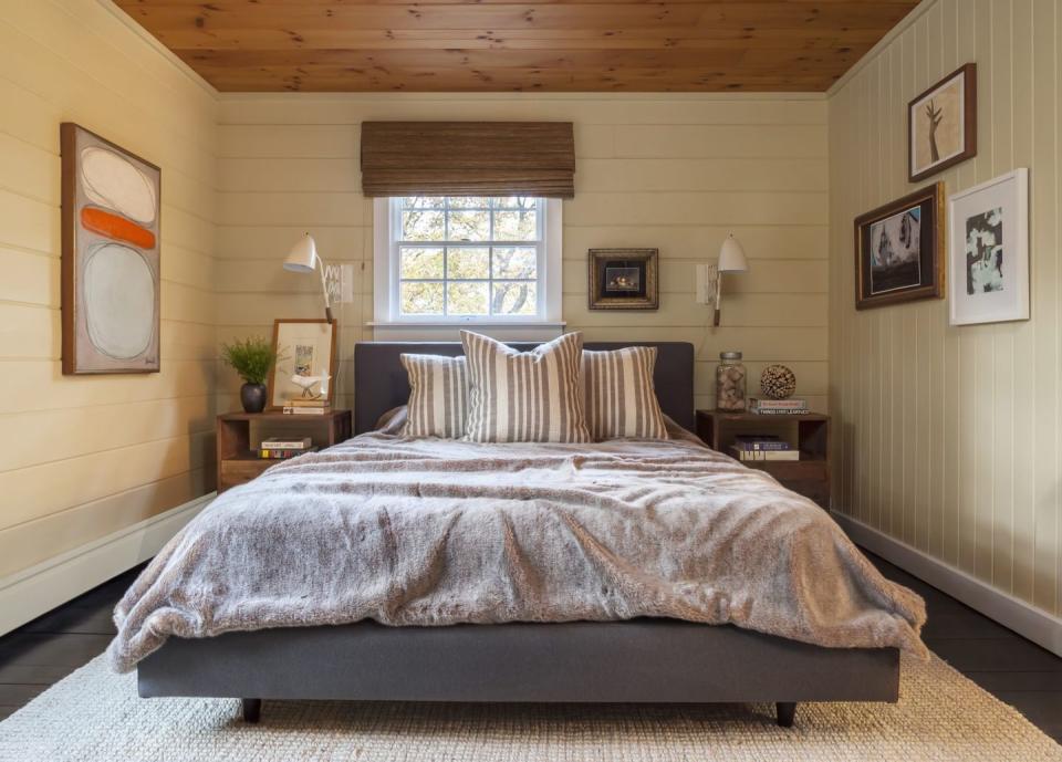 <p>This guest bedroom by <a href="https://deringhall.com/interior-designers/john-willey-willey-design-llc" rel="nofollow noopener" target="_blank" data-ylk="slk:John Willey;elm:context_link;itc:0;sec:content-canvas" class="link ">John Willey</a> features a soft color palette and cherished artwork. </p>