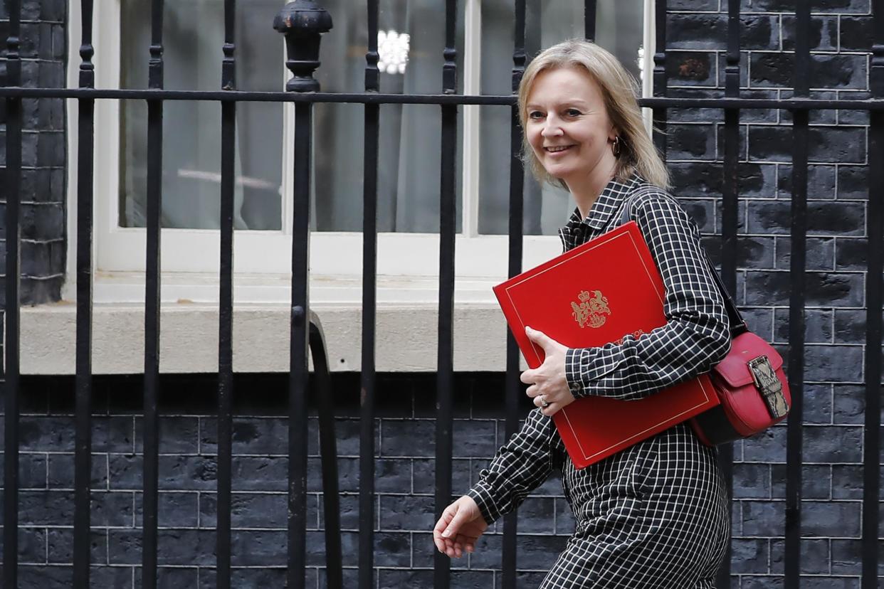 Britain's International Trade Secretary Liz Truss leaves from 10 Downing Street: AFP via Getty Images