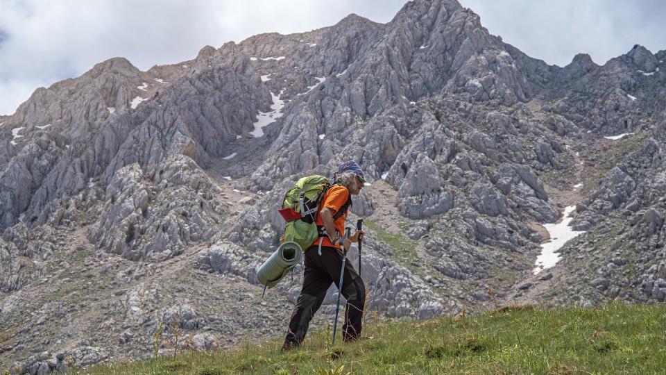 man hiking in mountains