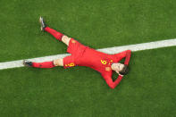 Spain's Gavi lays on the pitch during the World Cup group E soccer match between Spain and Germany, at the Al Bayt Stadium in Al Khor , Qatar, Sunday, Nov. 27, 2022. (AP Photo/Petr Josek)