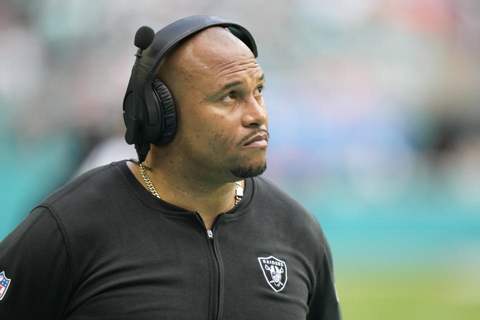 Las Vegas Raiders head coach Antonio Pierce watches the game during the second half of an NFL football game against the Miami Dolphins, Sunday, Nov. 19, 2023, in Miami Gardens, Fla. (AP Photo/Wilfredo Lee)