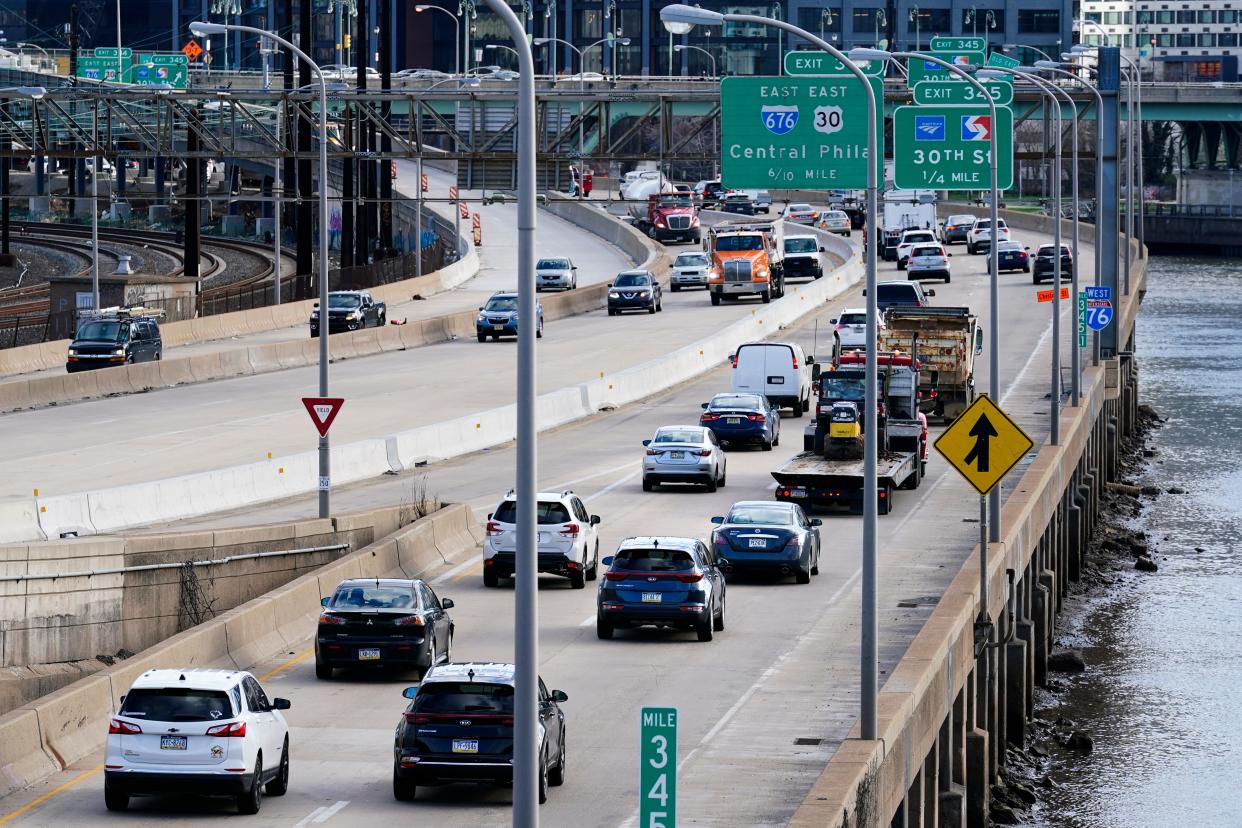 Morning traffic moves along Interstate 76 in Philadelphia on March 29, 2021.