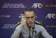 In this photo provided by the Korea Football Association, South Korea's head coach Paulo Bento listens to a question during a press conference after the Asian zone Group H qualifying soccer match against North Korea for the 2022 World Cup at Kim Il Sung Stadium in Pyongyang, North Korea, Tuesday, Oct. 15, 2019. (The Korea Football Association via AP)