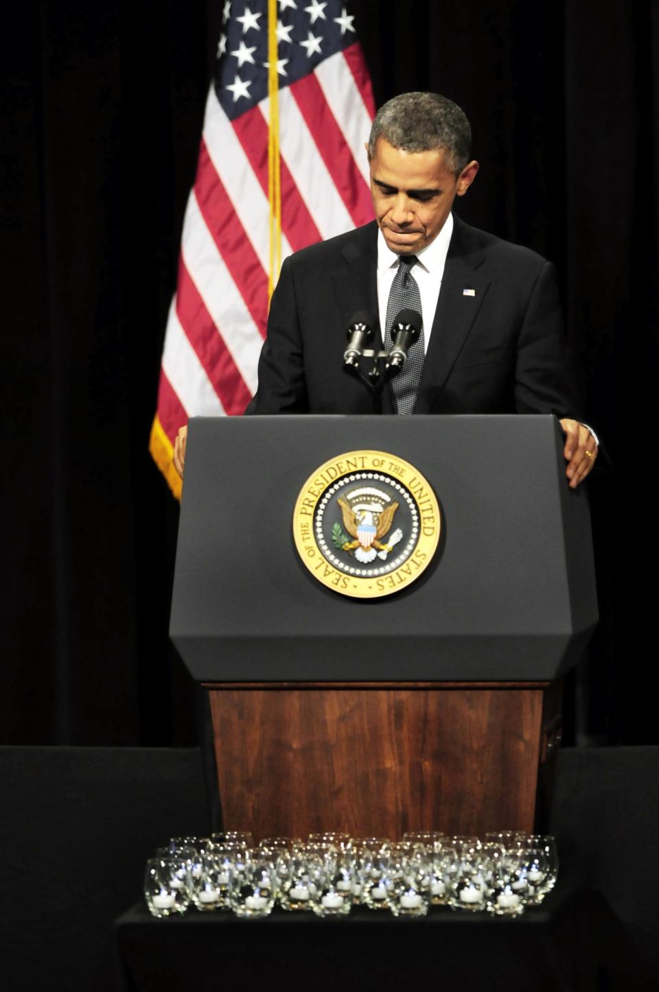 NEWTOWN, CT - DECEMBER 16: U.S. President Barack Obama speaks at an interfaith vigil for the shooting victims from Sandy Hook Elementary School on December 16, 2012 at Newtown High School in Newtown, Connecticut. Twenty-six people were shot dead, including twenty children, after a gunman identified as Adam Lanza opened fire at Sandy Hook Elementary School. Lanza also reportedly had committed suicide at the scene. A 28th person, believed to be Nancy Lanza, found dead in a house in town, was also believed to have been shot by Adam Lanza. (Photo by Stephen Dunn-Pool/Getty Images)