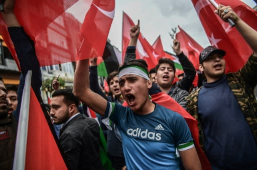 Thousands protested in Istanbul as the US moved its embassy from Tel Aviv to Jerusalem and Turkey accused the United States of sharing responsibility with Israel for a "vile massacre" along the Gaza border in which 52 Palestinians were killed