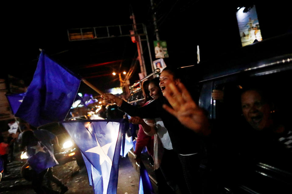 <p>Supporters of President Juan Orlando Hernandez, who is also National Party presidential candidate, celebrate as they wait for official presidential election results in Tegucigalpa, Honduras, Nov. 29, 2017. (Photo: Edgard Garrido/Reuters) </p>