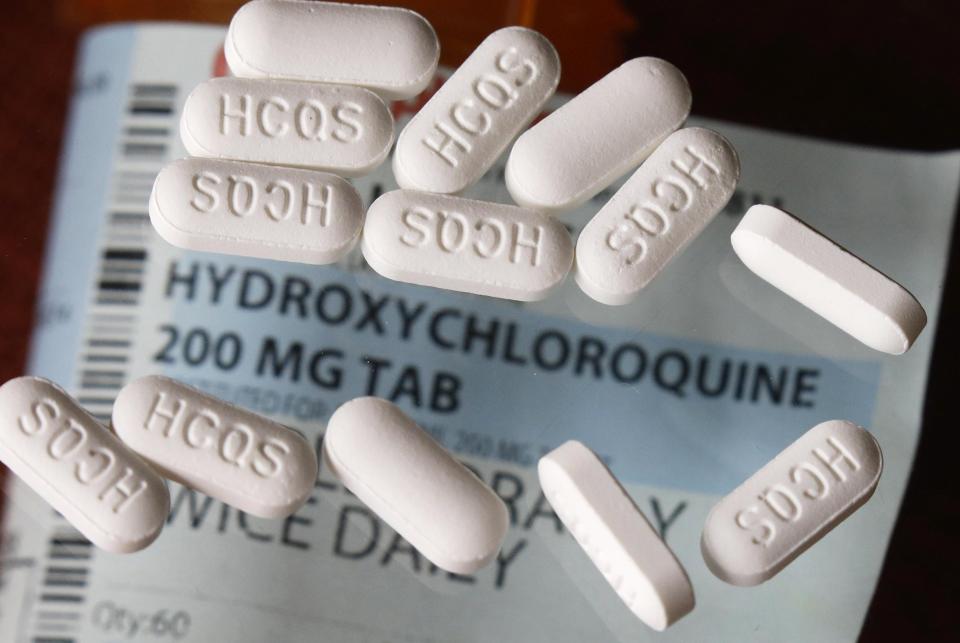 This Monday, April 6, 2020, photo shows an arrangement of hydroxychloroquine pills in Las Vegas.