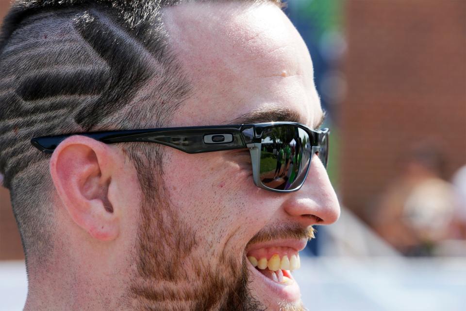 100 mile rider Dean McCombs of Lima, Ohio, waits at for the 180 mile finish line at Market Square in New Albany, Ohio, during the 6th Pelotonia in 2014.