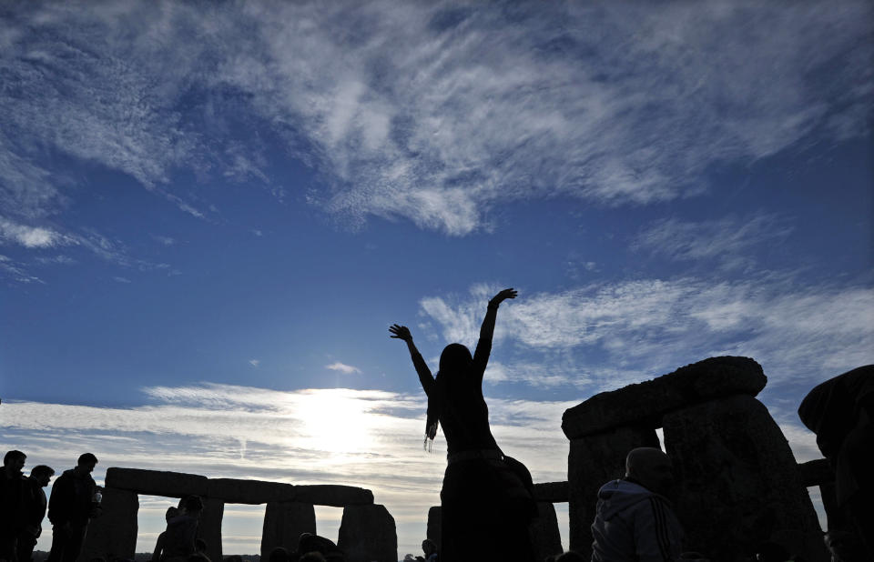 Revelers celebrate the pagan festival of 'Summer Solstice' at Stonehenge in Wiltshire in southern England, on June 21, 2010. (Carl Court/AFP/Getty Images)