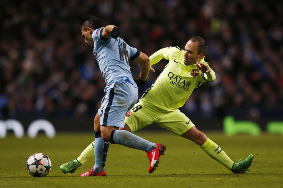 Football - Manchester City v FC Barcelona - UEFA Champions League Second Round First Leg - Etihad Stadium, Manchester, England - 24/2/15 Manchester City's Sergio Aguero in action with Barcelona's Andres Iniesta Reuters / Phil Noble Livepic EDITORIAL USE ONLY.