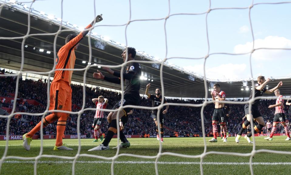 <p>Hull City’s Eldin Jakupovic celebrates saving a penalty from Southampton’s Dusan Tadic </p>