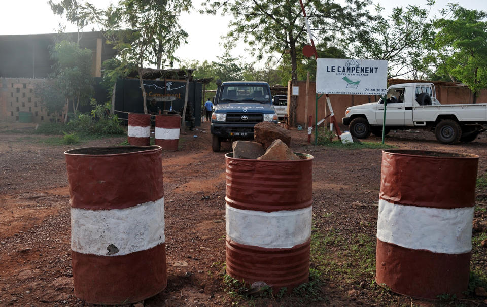 <p>A vehicle of the gendarmarie is parked at the entrance to the Kangaba tourist resort in Bamako on June 19, 2017, a day after suspected jihadists stormed the resort, briefly seizing more than 30 hostages and leaving at least two people dead. (Habibou Kouyate/AFP/Getty Images) </p>