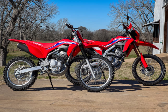 A 250cc, air-cooled beginner trail bike on left, a 300cc liquid-cooled dual sport bike on the right; (photo/Seiji Ishii)