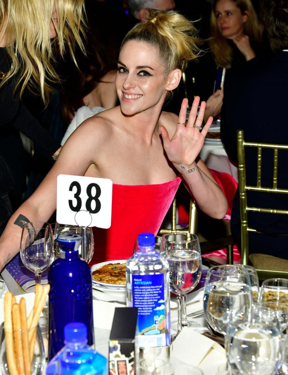 <p>Honoree Kristen Stewart greets the cameras with a smile on Nov. 29 at the 2021 Gotham Awards in N.Y.C.</p>