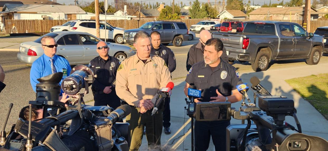 (Left) Fresno County Sheriff John Zanoni and (right) Selma Police Chief Rudy Alcaraz provide an update on a shooting that left officer  Gonzalo Carrasco dead.