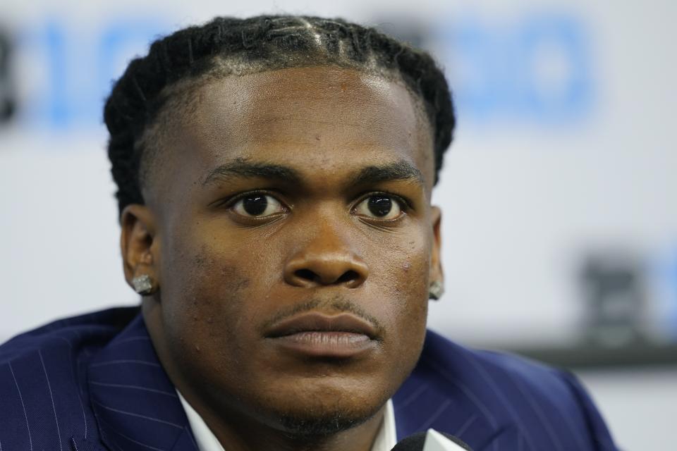 FILE - Penn State's Ji'Ayir Brown talks to reporters during an NCAA college football news conference at the Big Ten Conference media days, at Lucas Oil Stadium, Wednesday, July 27, 2022, in Indianapolis. “Having an opportunity to change other peoples' lives, that's what's cool about NIL,” said Penn State quarterback Sean Clifford. “It's not what we're doing or what I'm doing,” Clifford said, “it's about what Ji'Ayir came from to now where he's at, being able to impact a dude like that. (AP Photo/Darron Cummings, File)