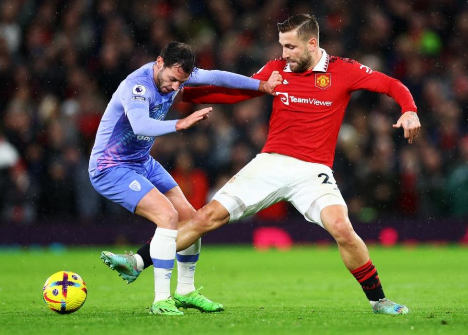 Luke Shaw gets a foot in against Bournemouth’s Adam Smith