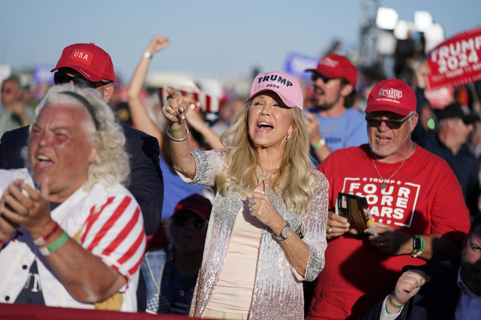 Supporters of former President Donald Trump cheer as he speaks at a campaign rally at Waco Regional Airport, Saturday, March 25, 2023, in Waco, Texas. (AP Photo/Evan Vucci)