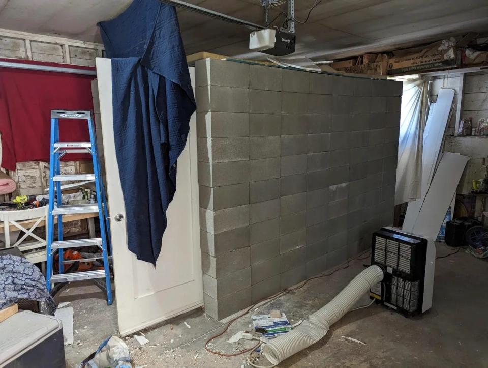 This undated photo provided by the FBI's Portland Field Office shows a makeshift cinder-block cell in Klamath Falls, Oregon, allegedly used by 29-year-old Negasi Zuberi to hold a woman prisoner. The FBI said Aug. 1, 2023, police in Reno, Nevada, arrested Zuberi.