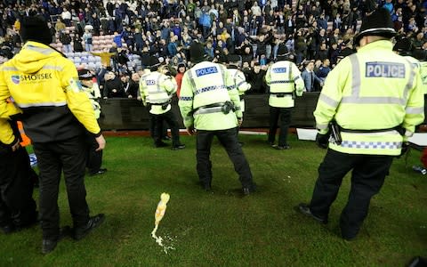 Missiles - FA poised for investigation after Sergio Aguero clashes with invading fan after Manchester City's Cup exit at Wigan - Credit: Action Images 