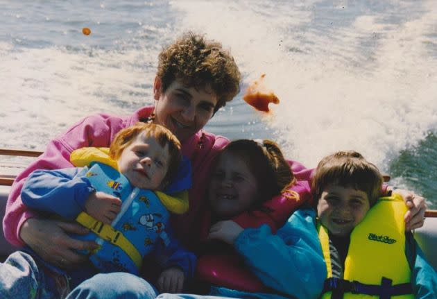 The author and her children in a friend’s boat in 1993. 