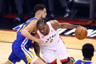 Kawhi Leonard #2 of the Toronto Raptors is defended by Klay Thompson #11 of the Golden State Warriors in the first quarter during Game One of the 2019 NBA Finals at Scotiabank Arena on May 30, 2019 in Toronto, Canada. (Photo by Vaughn Ridley/Getty Images)
