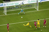 Ecuador's Enner Valencia heads the ball to score his side's second goal during the World Cup, group A soccer match between Qatar and Ecuador at the Al Bayt Stadium in Al Khor , Qatar, Sunday, Nov. 20, 2022. (AP Photo/Thanassis Stavrakis)