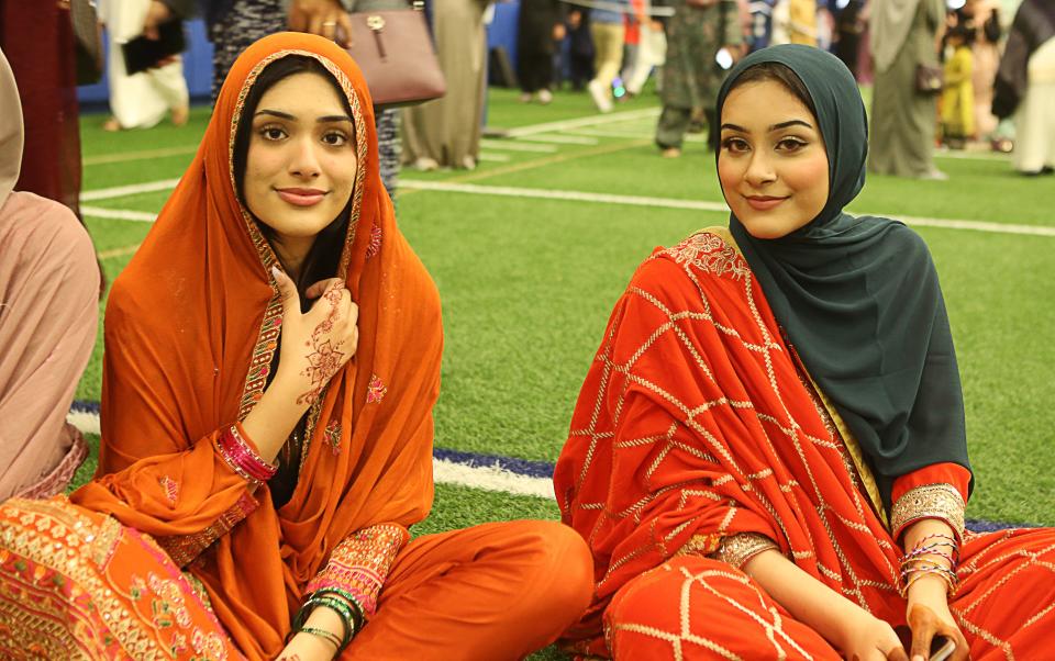 Aisha (left) and Tayyaba Farooq (right) celebrate the end of Ramadan on April 21, 2023 at the Delaware Field House.