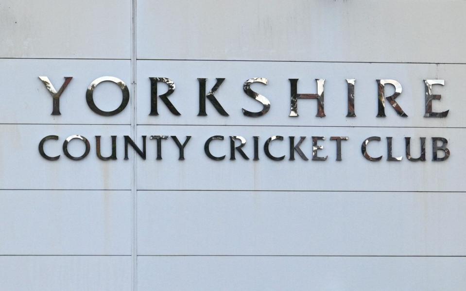 The white rose logo for Yorkshire County Cricket Club is pictured outside Headingley, the home of Yorkshire cricket on November 5, 2021. - Yorkshire were suspended from staging international matches after the England and Wales Cricket Board strongly condemned their handling of a racism row involving Azeem Rafiq, with ex-England captain Michael Vaughan later denying allegations he had abused his one-time team-mate