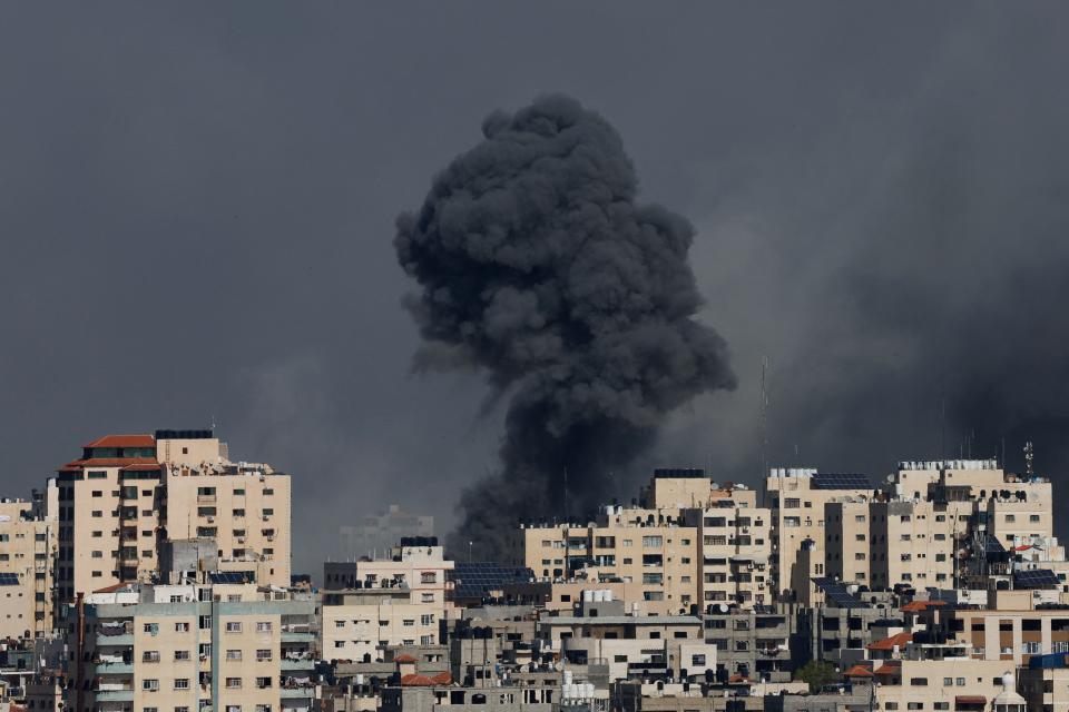 Smoke rises following Israeli strikes in Gaza, October 7, 2023.