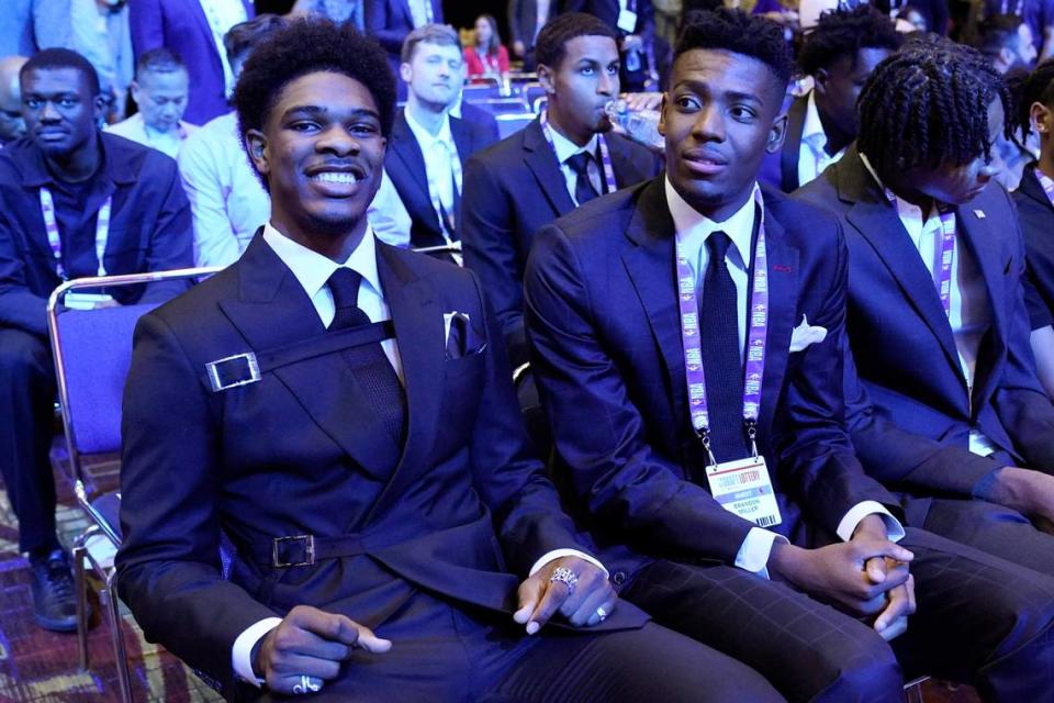 Scoot Henderson, left, and Brandon Miller attend May’s NBA basketball draft lottery in Chicago. (AP Photo/Nam Y. Huh)