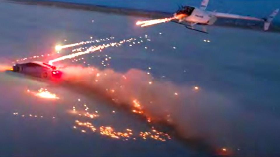 PHOTO: A still from the video 'Destroying a Lamborghini with Fireworks,' included in a complaint filed against Suk Min Choi, aka Alex Choi. (U.S. Department of Justice)