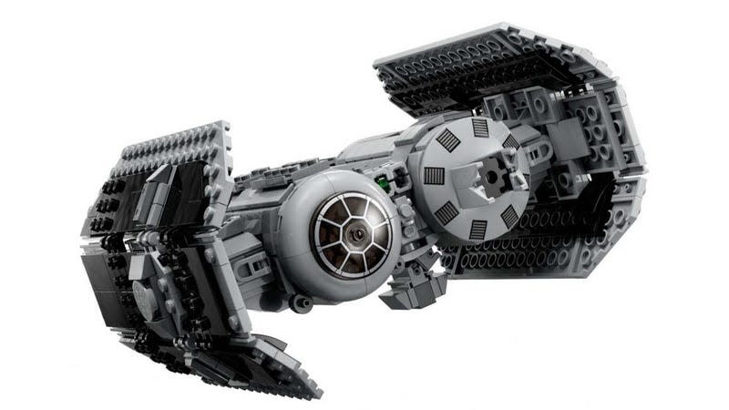 A photo shows the new Lego TIE Bomber as it flies across a white background. 