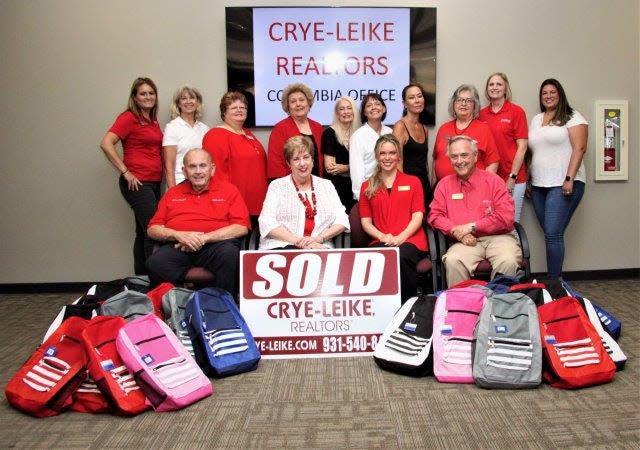 Crye-Leike Real Estate Services' Columbia office collected dozens of backpacks for the company's annual Backpack Heroes program across Middle Tennessee.